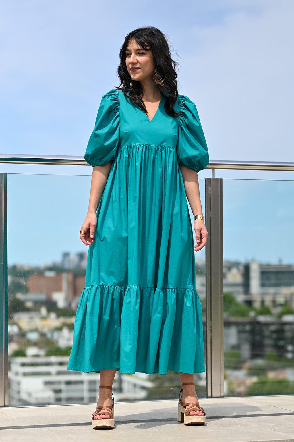 Turquoise dress with outlet sleeves